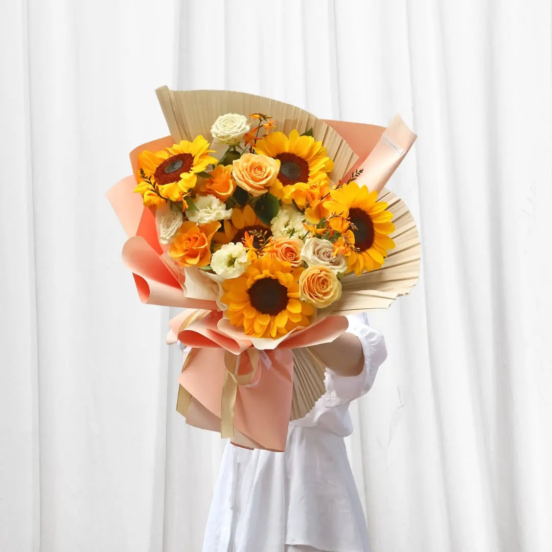 Golden Radiance Bouquet with Sunflowers, Peach Roses, White Roses, Lisianthus, Freesia, and Greenery - Flower Delivery Hong Kong